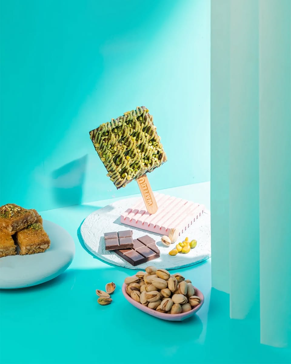 Customers enjoying portable treats by the water