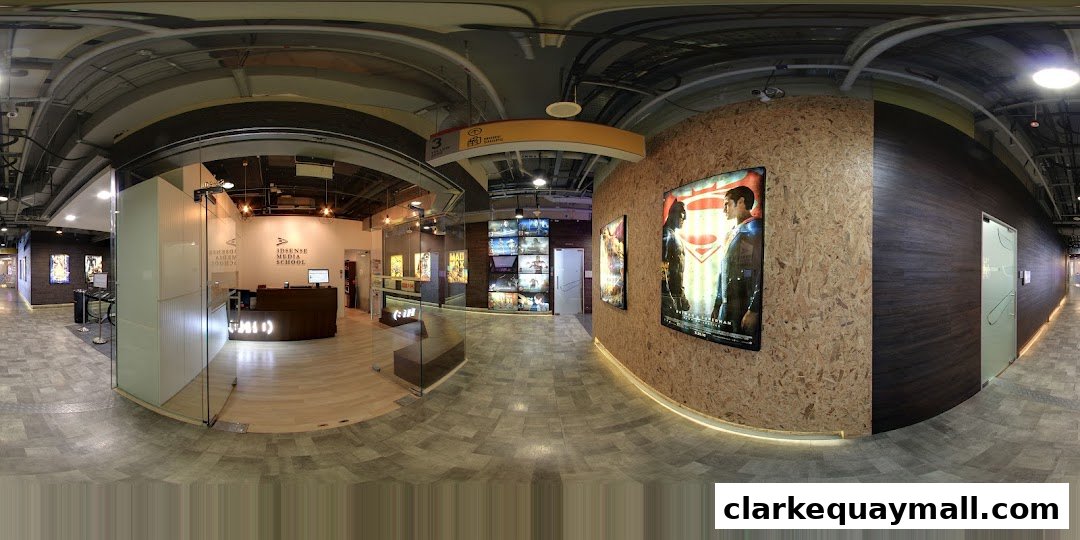 Interior view of 3dsense Media School with reception, movie posters, and displays.