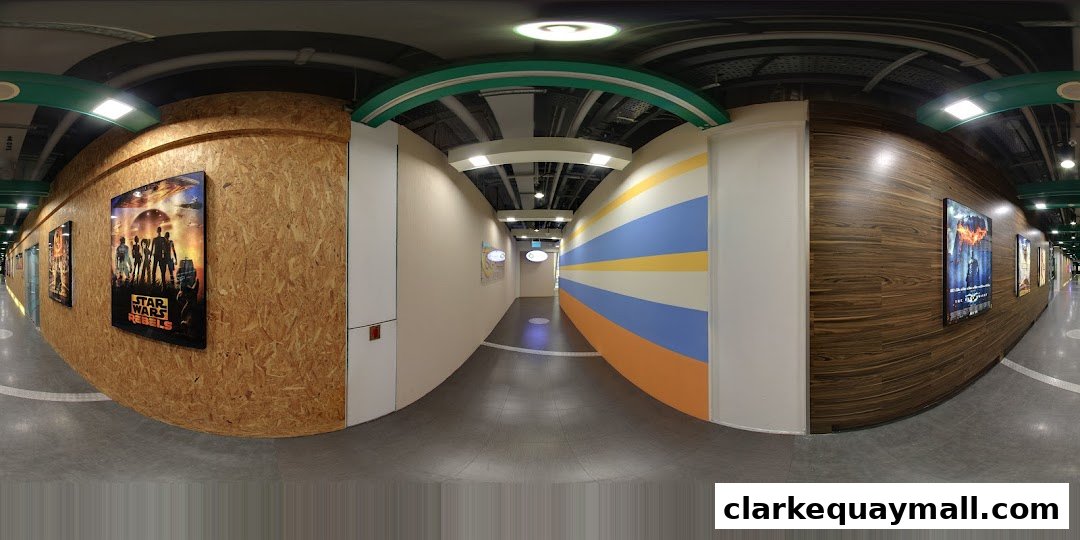 A panoramic view of a modern hallway with movie posters and colorful wall art.