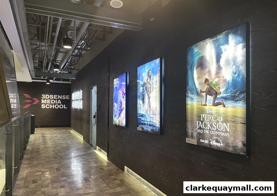 Interior hallway of 3DSENSE Media School with movie posters on the wall.
