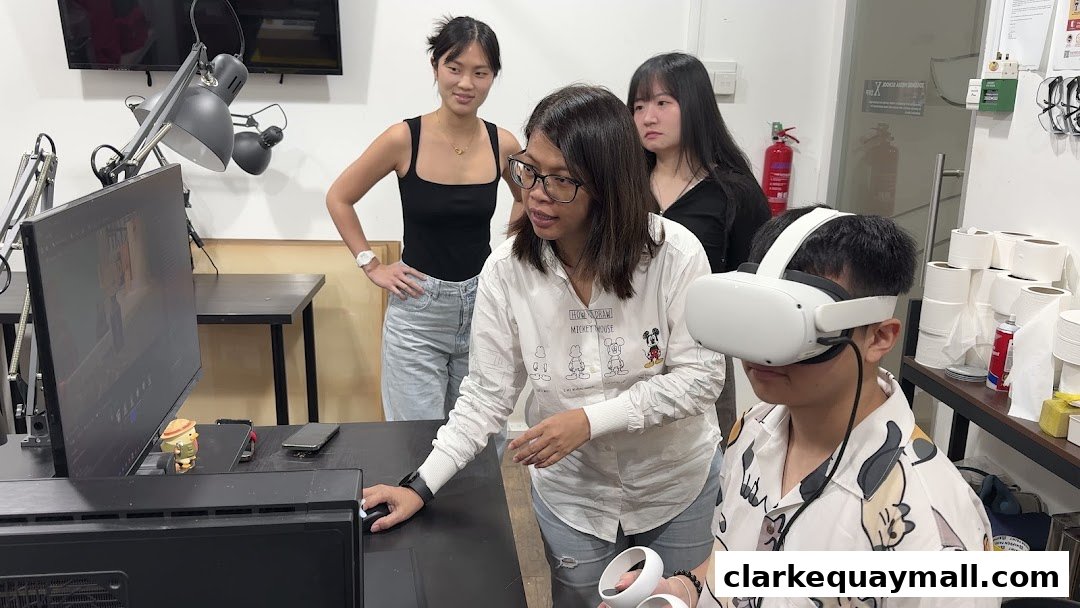 Students learning VR technology with an instructor at 3dsense Media School.