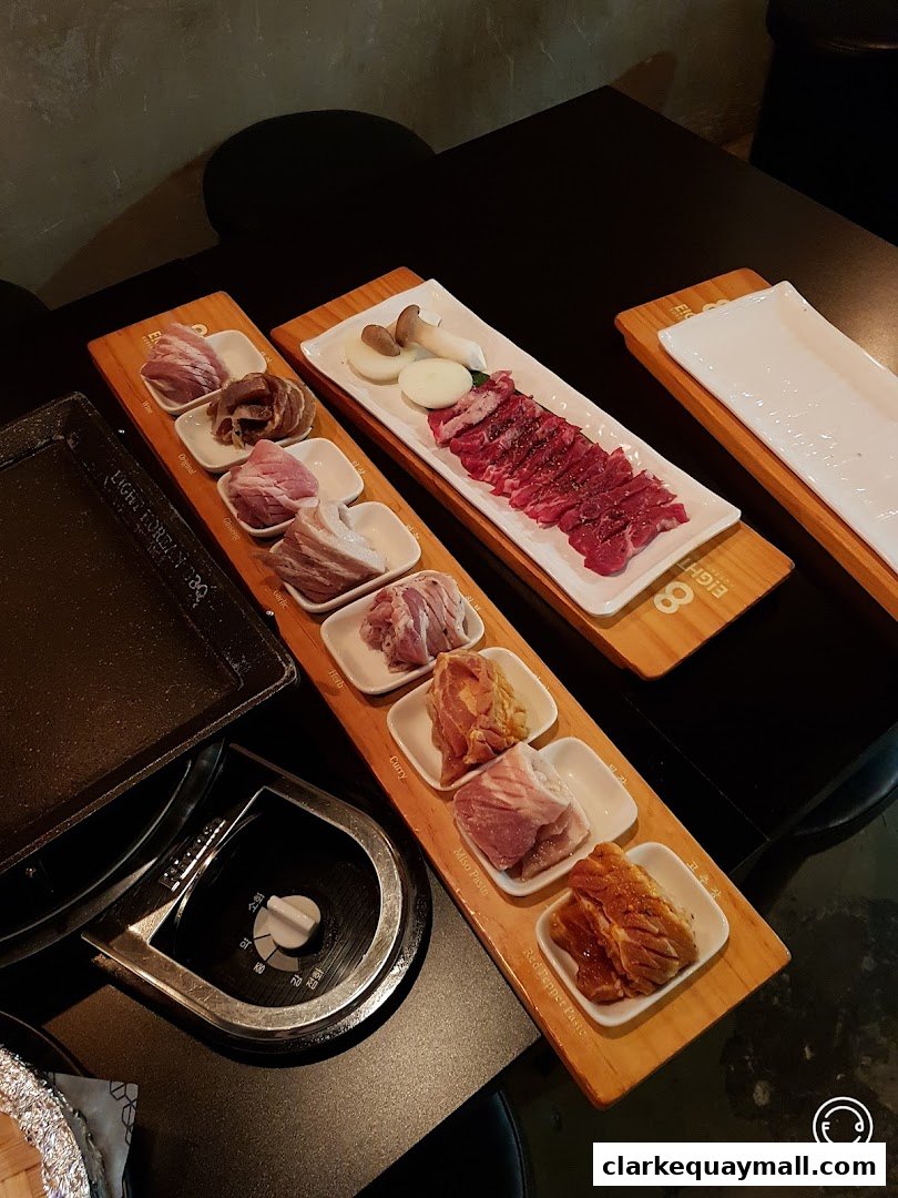Assortment of marinated meats and vegetables for Korean BBQ.