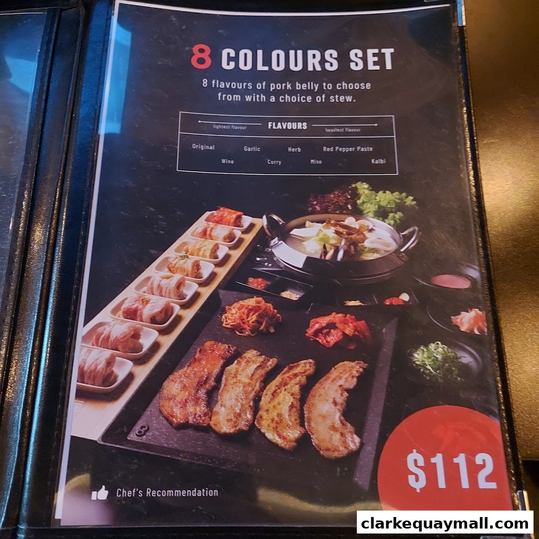A menu showcasing the '8 Colours Set' with 8 flavors of pork belly and a stew.