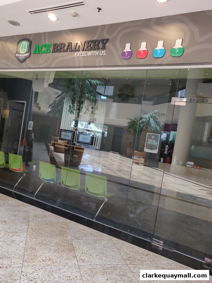The storefront of Ace Brainery, featuring its logo, name, and colorful lab flasks.
