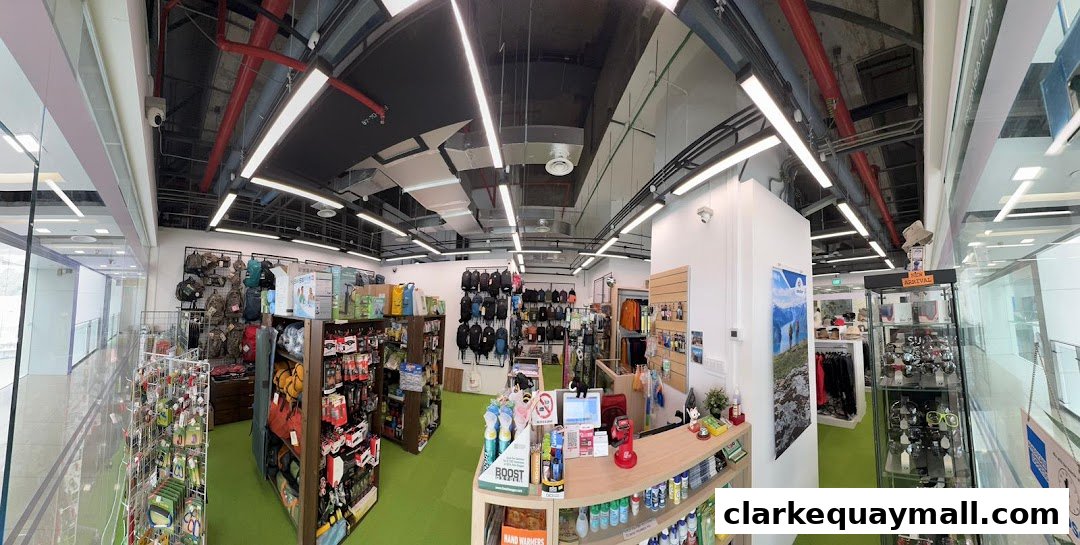 Interior view of Adventure 21 shop, showcasing outdoor gear, backpacks, and accessories.