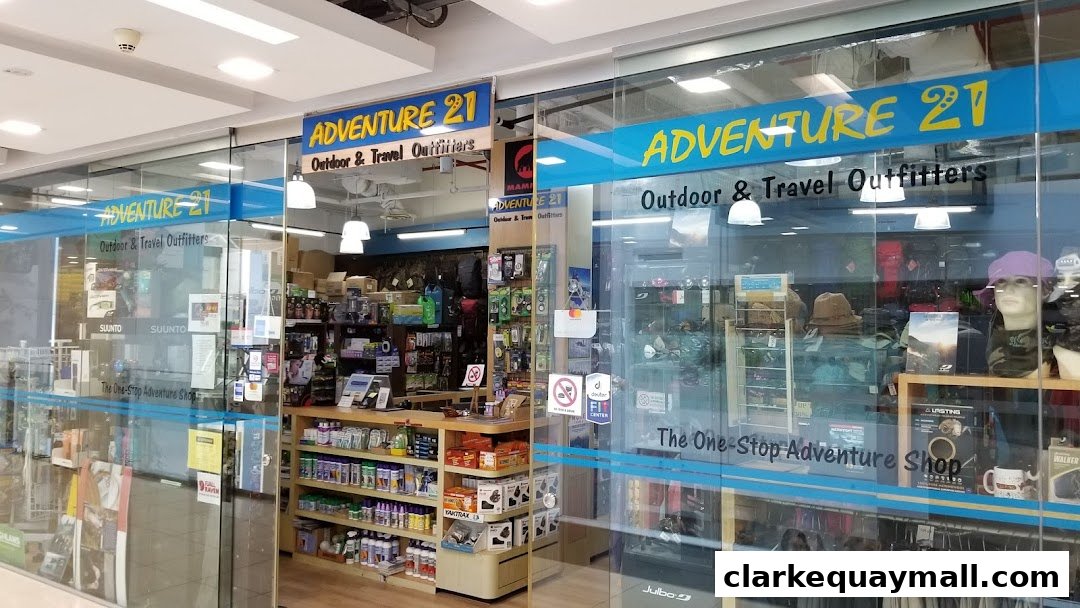 Exterior view of Adventure 21, an outdoor and travel outfitters shop, showcasing various gear and apparel.