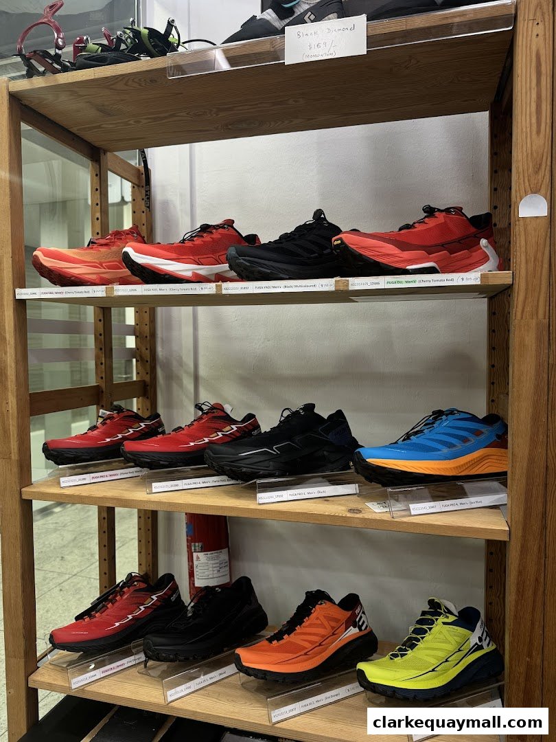 Shelves display various running shoes in different colors and styles.