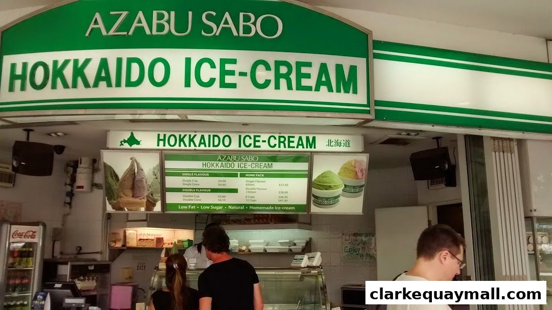 Azabu Sabo Hokkaido Ice-Cream shop front with a menu displaying prices and flavors.
