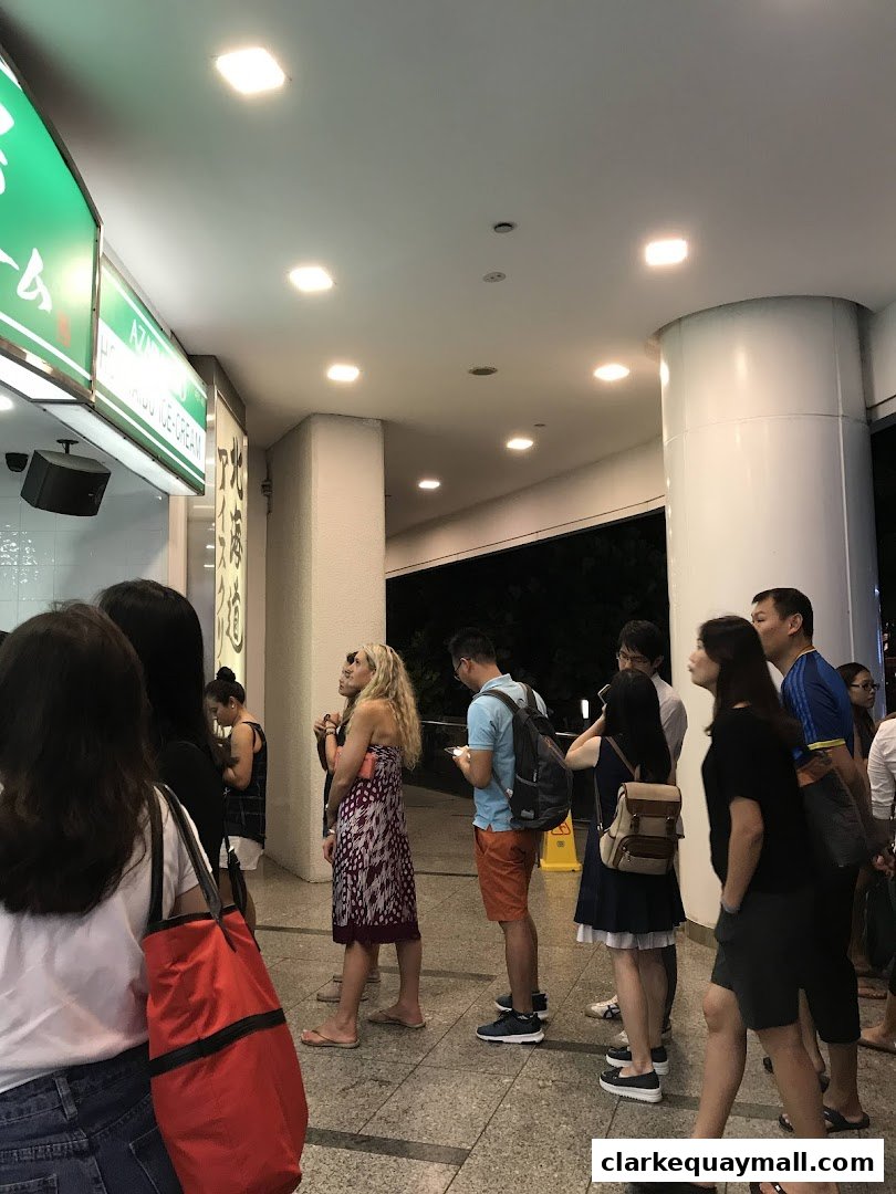 People queuing outside Azabu Sabo Clarke Quay Singapore, a popular ice cream shop.