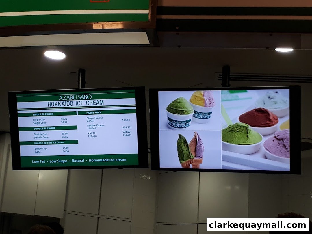 A digital menu board displaying Hokkaido ice cream flavors and prices.