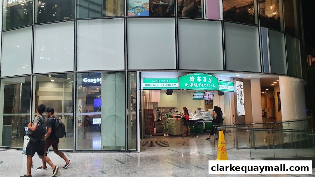 The entrance of Azabu Sabo Hokkaido Ice-Cream shop at night.