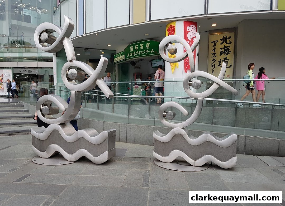 The entrance of Azabu Sabo ice cream shop with abstract sculptures in front.