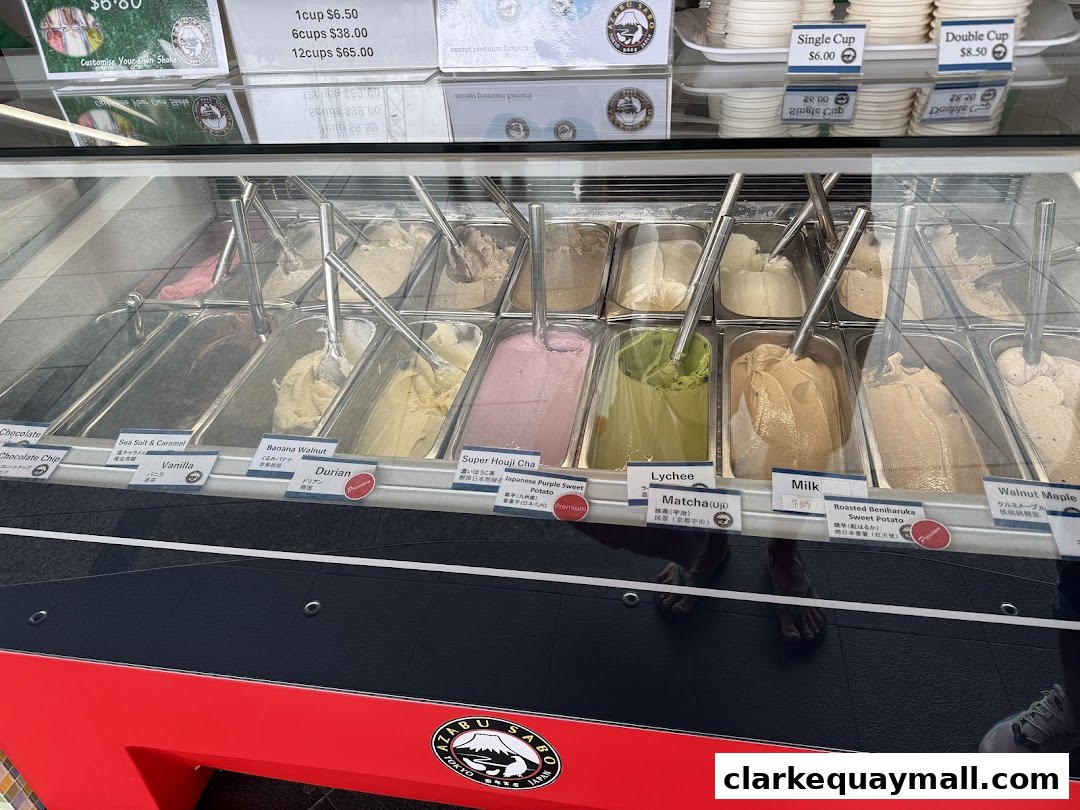 A display case filled with various flavors of gelato at Azabu Sabo.