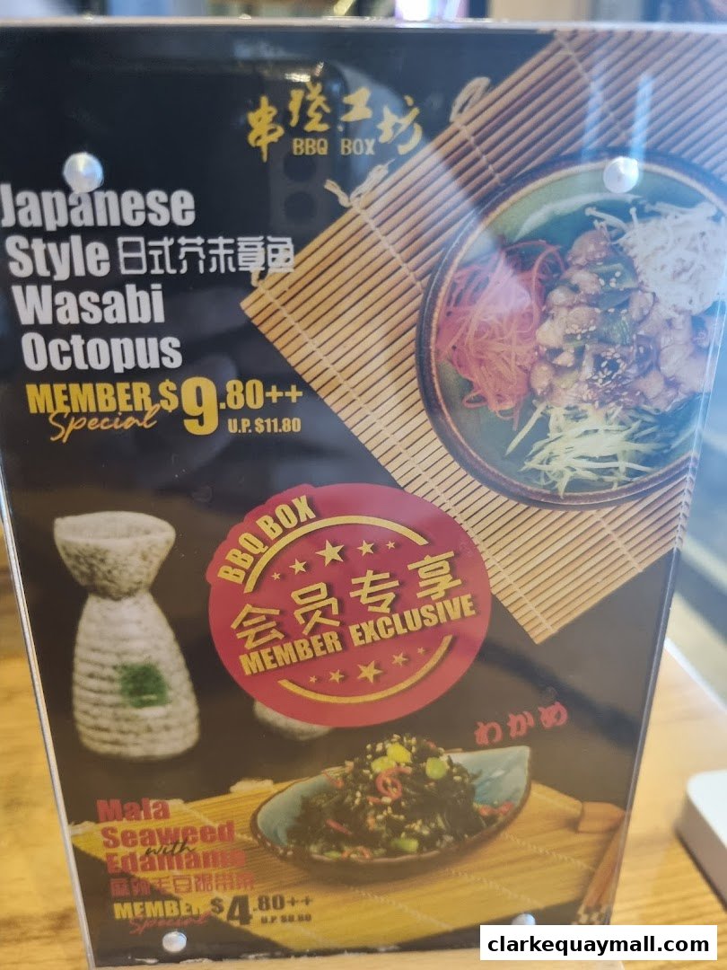 A menu board featuring Japanese style Wasabi Octopus and Mala Seaweed Edamame.