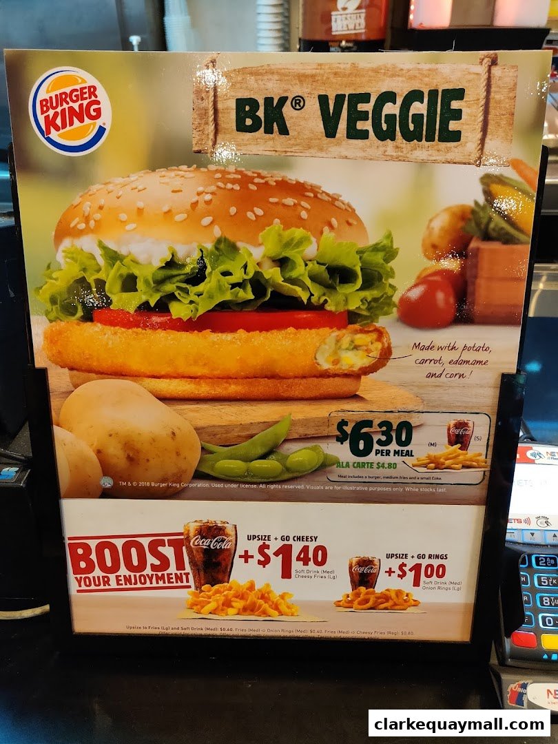 Burger King menu featuring the BK Veggie burger and upsell options.