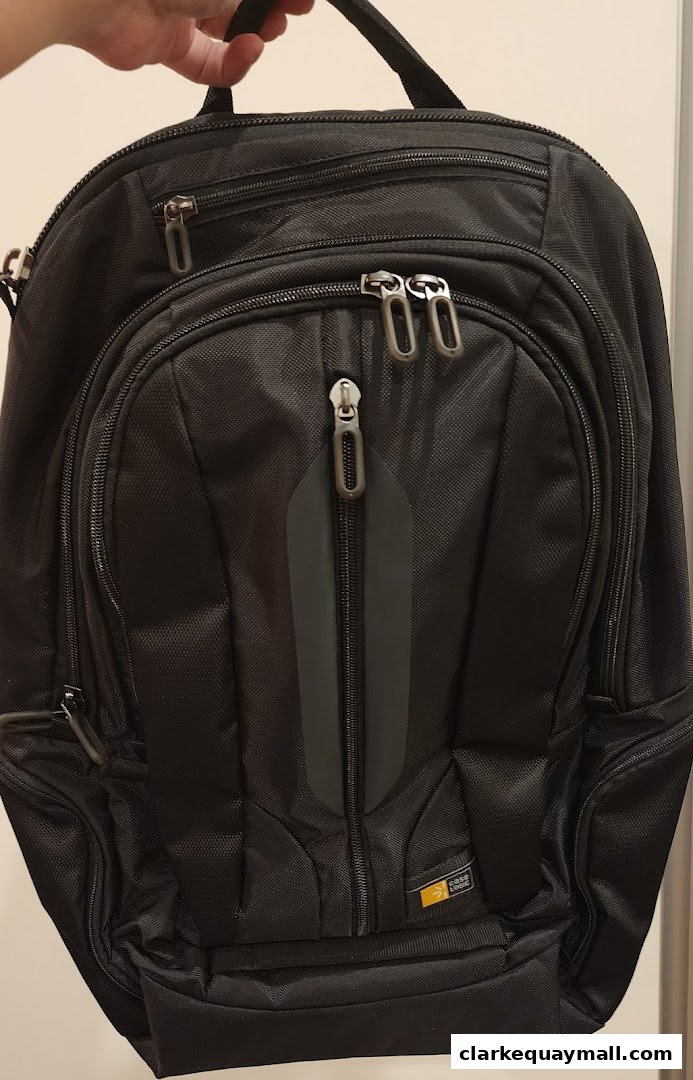 A black Case Logic backpack with multiple zippered compartments and a logo.