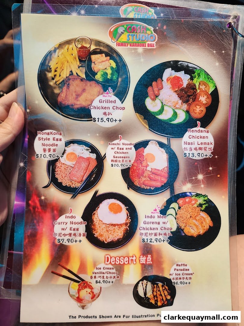 A menu from Cash Studio Family Karaoke Box featuring various main dishes and desserts.