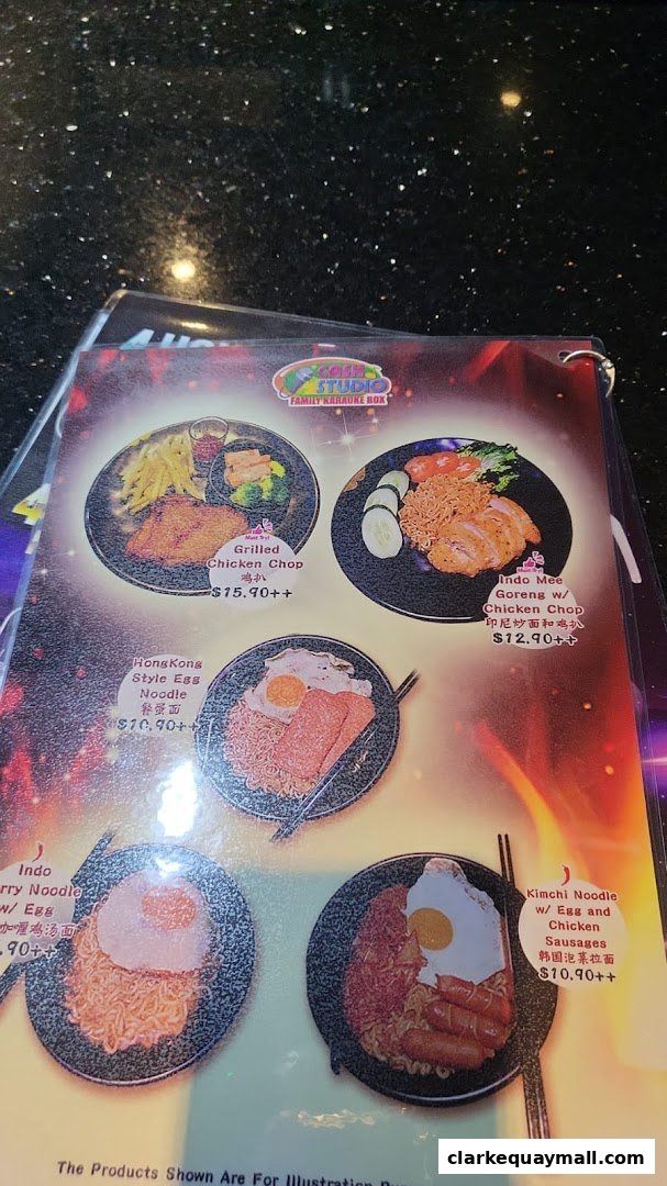 A menu from Cash Studio Family Karaoke Box featuring various noodle dishes and a chicken chop.