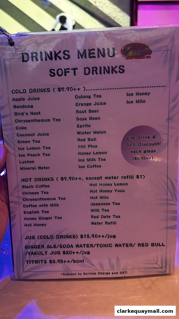 A drinks menu for Cash Studio Family Karaoke Box featuring soft and hot drinks, jugs, and titbits.