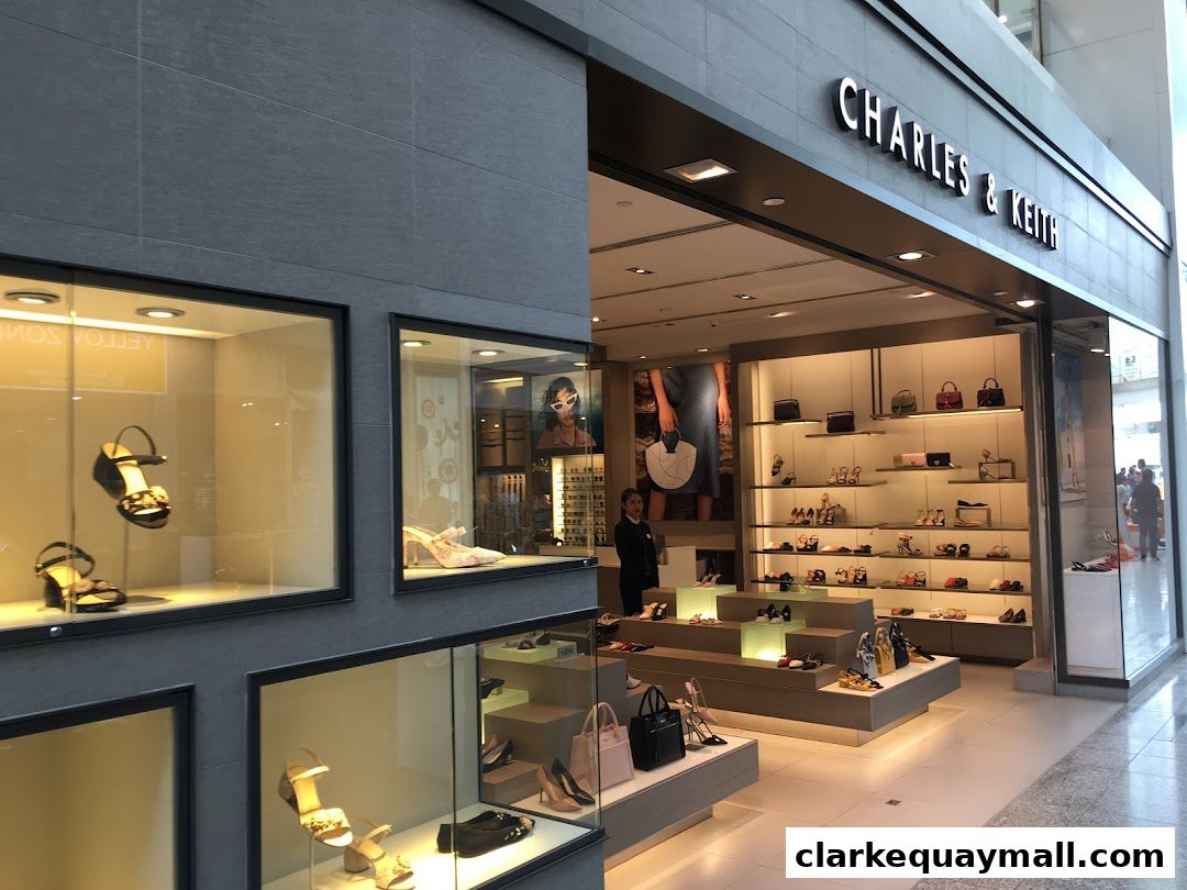 Charles & Keith store showcasing stylish shoes and handbags in window displays and interior shelves.