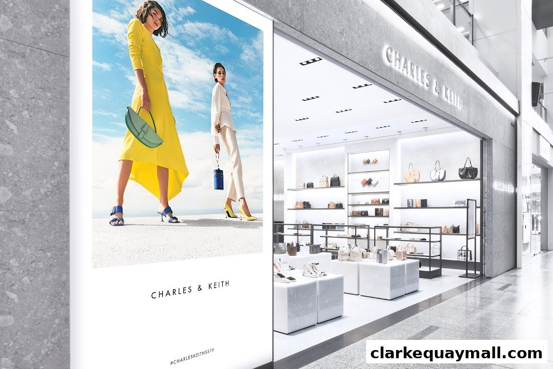 Charles & Keith store interior showcasing handbags and shoes, with an advertisement featuring models.