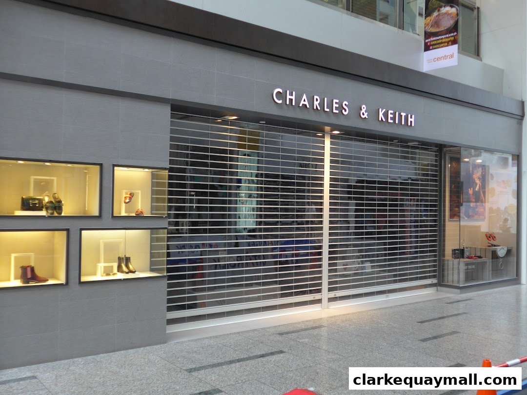 The Charles & Keith store front with display windows showcasing shoes and bags.