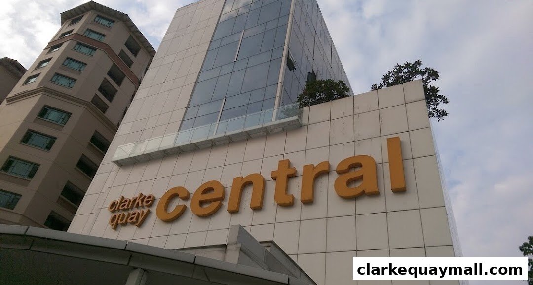 Exterior view of the Clarke Quay Central building with prominent signage.