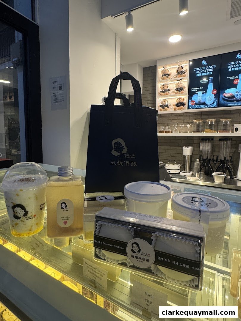 A display case filled with desserts and drinks from Chou Niang Fermented Rice.