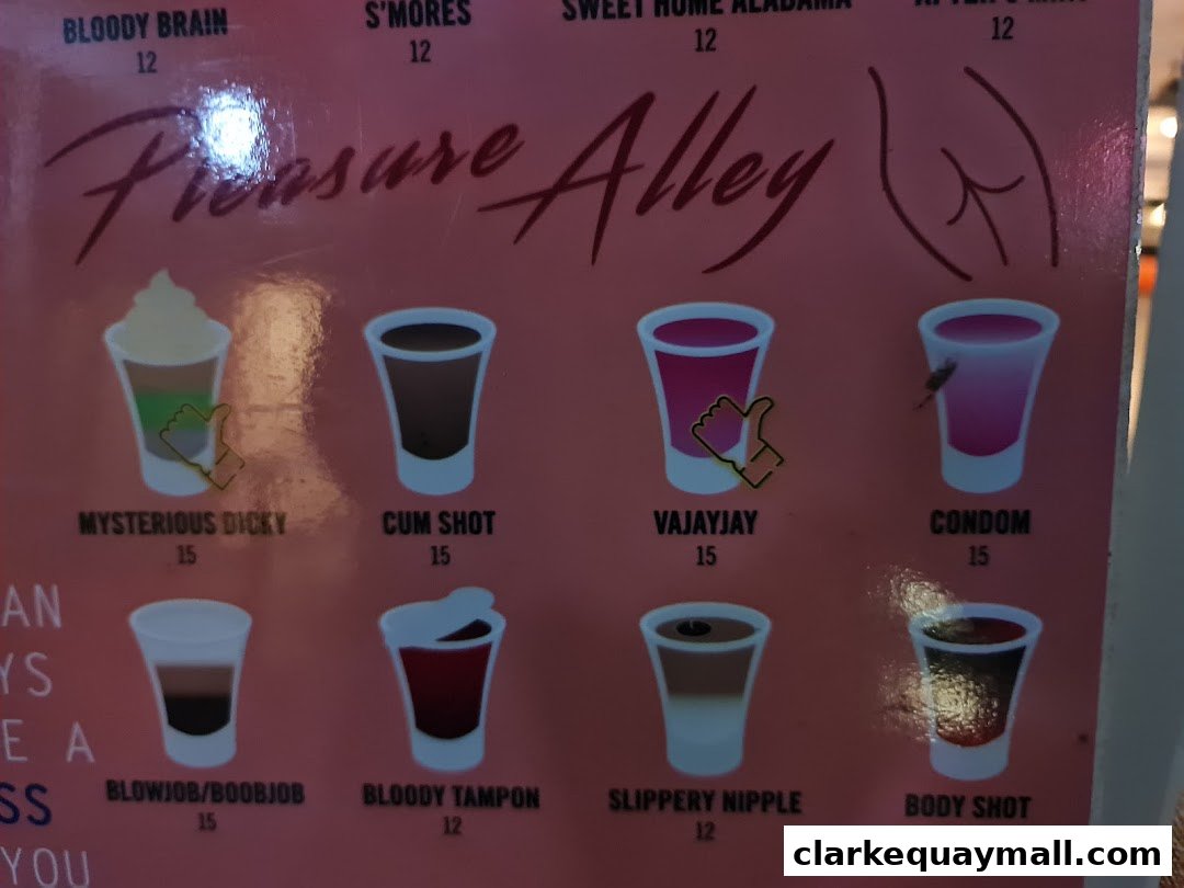 A menu featuring various shot drinks with provocative names and prices.