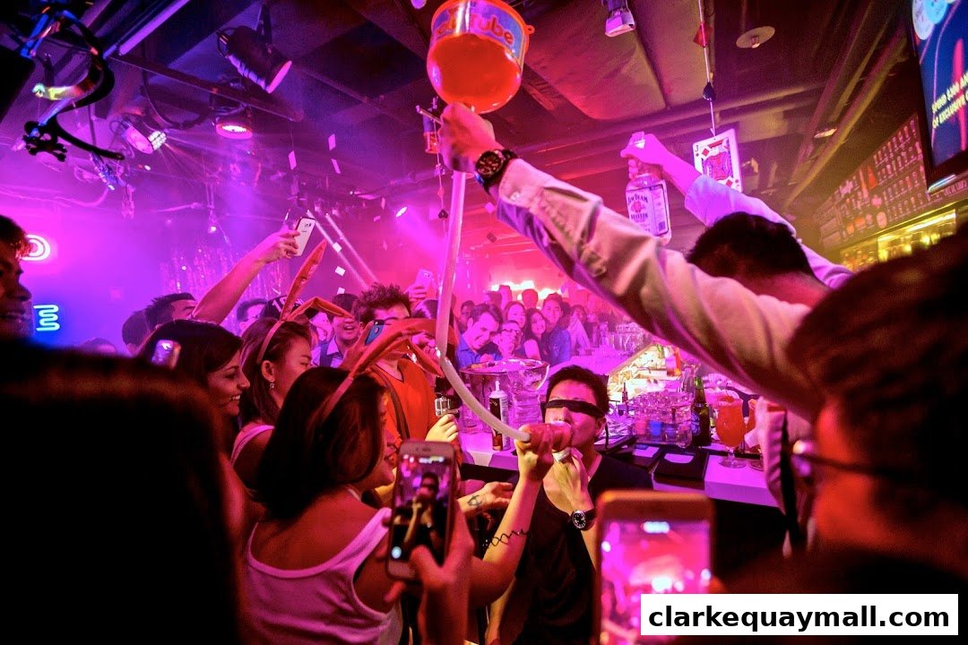 A lively bar scene with people celebrating and drinking, illuminated by purple lights.