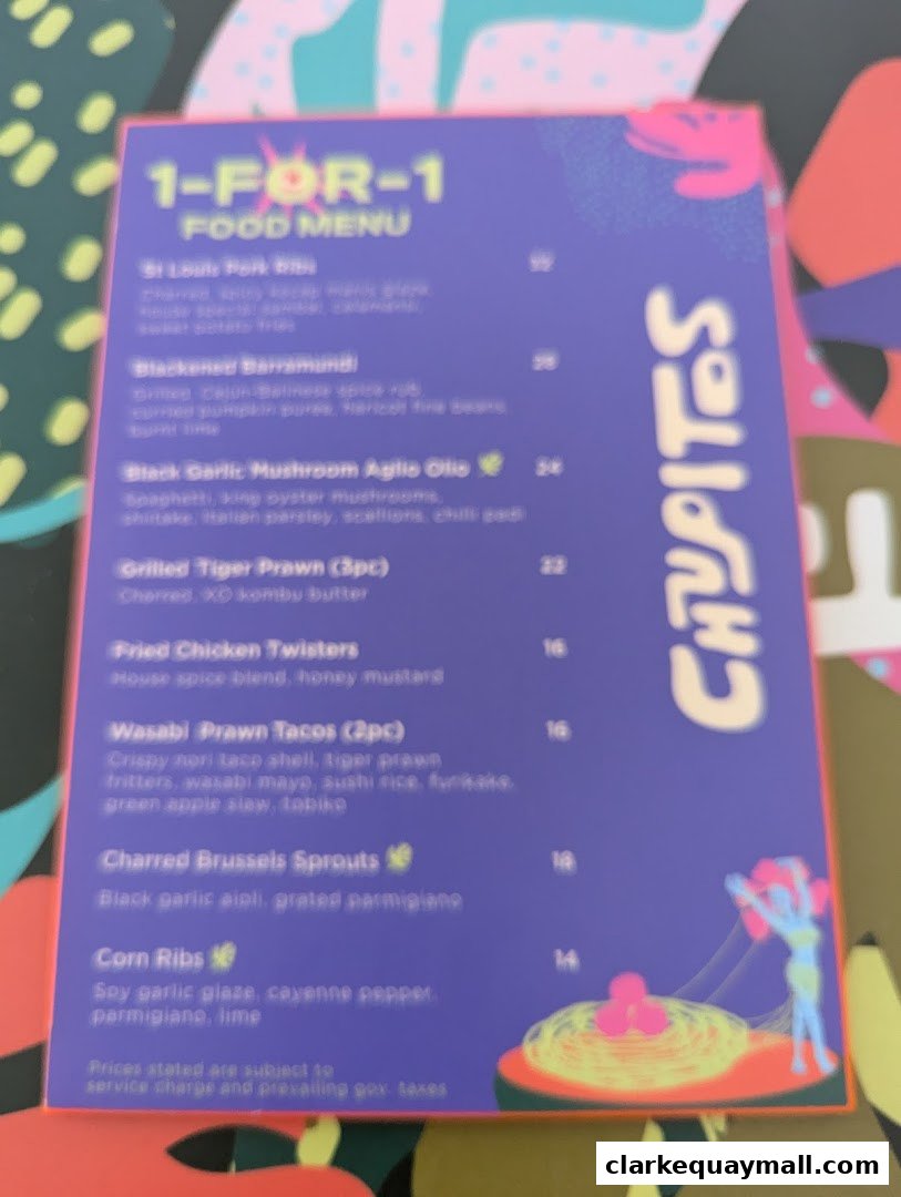 A vibrant menu for Chupitos featuring a 1-for-1 food offer with various dishes.