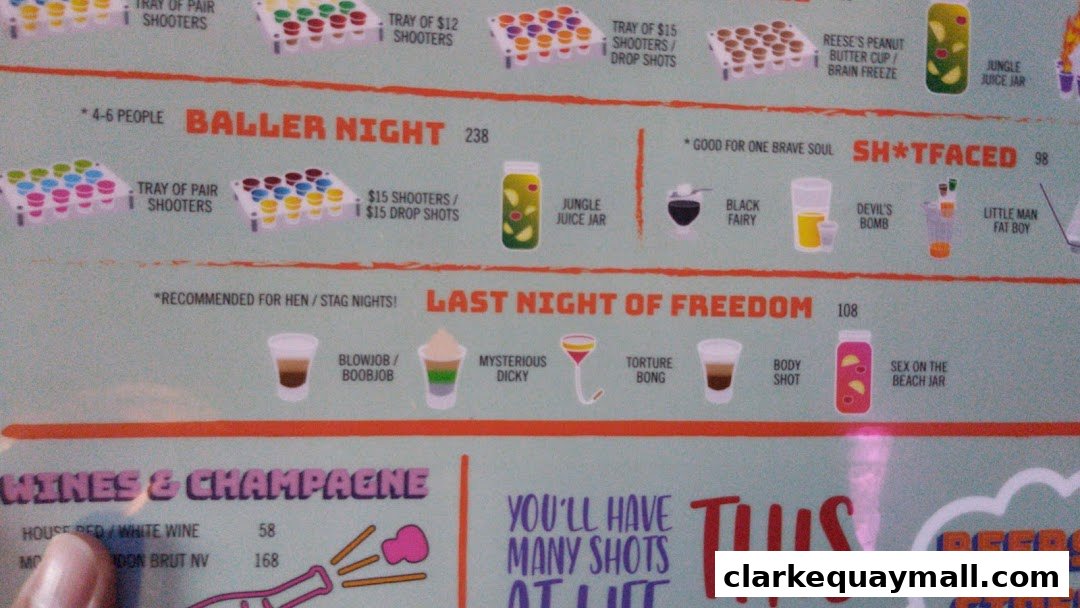 A menu featuring various shots, drinks, and wine options with playful names and prices.