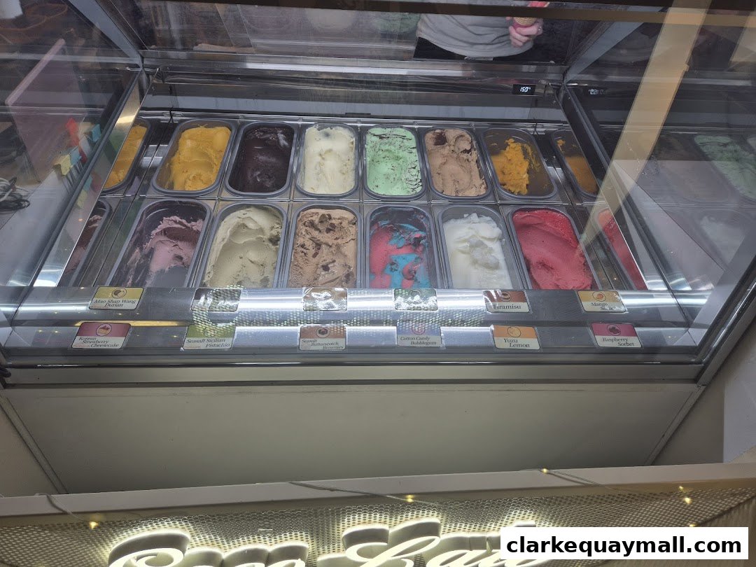 A display case filled with various flavors of ice cream at Cocolato.