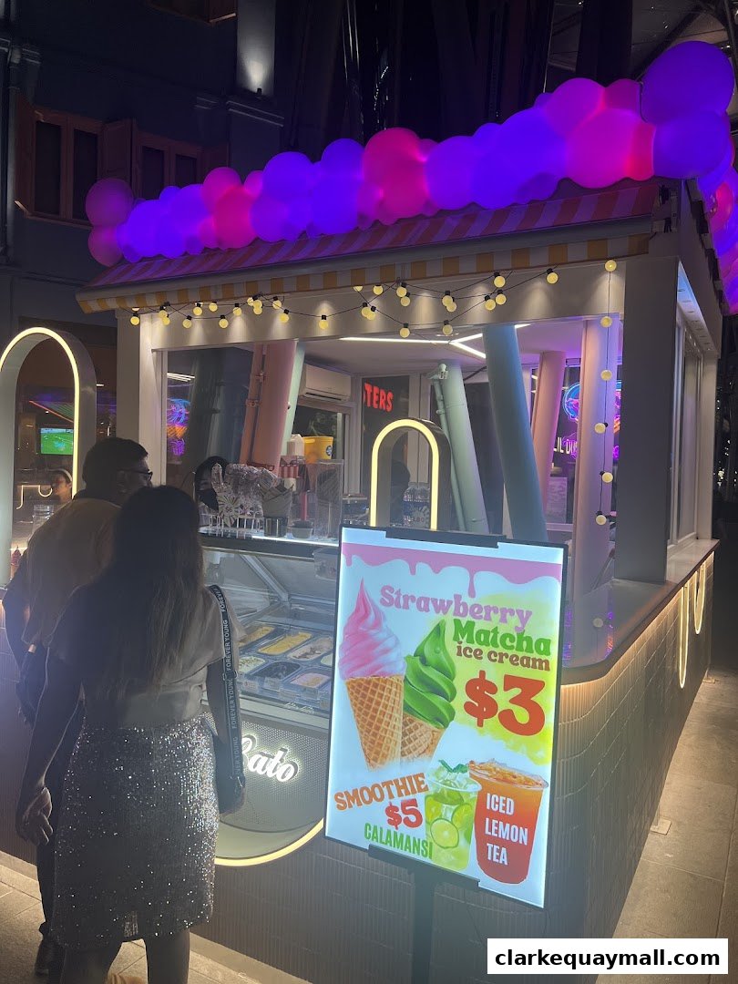 A brightly lit ice cream shop called Cocolato with colorful balloons and a menu board.