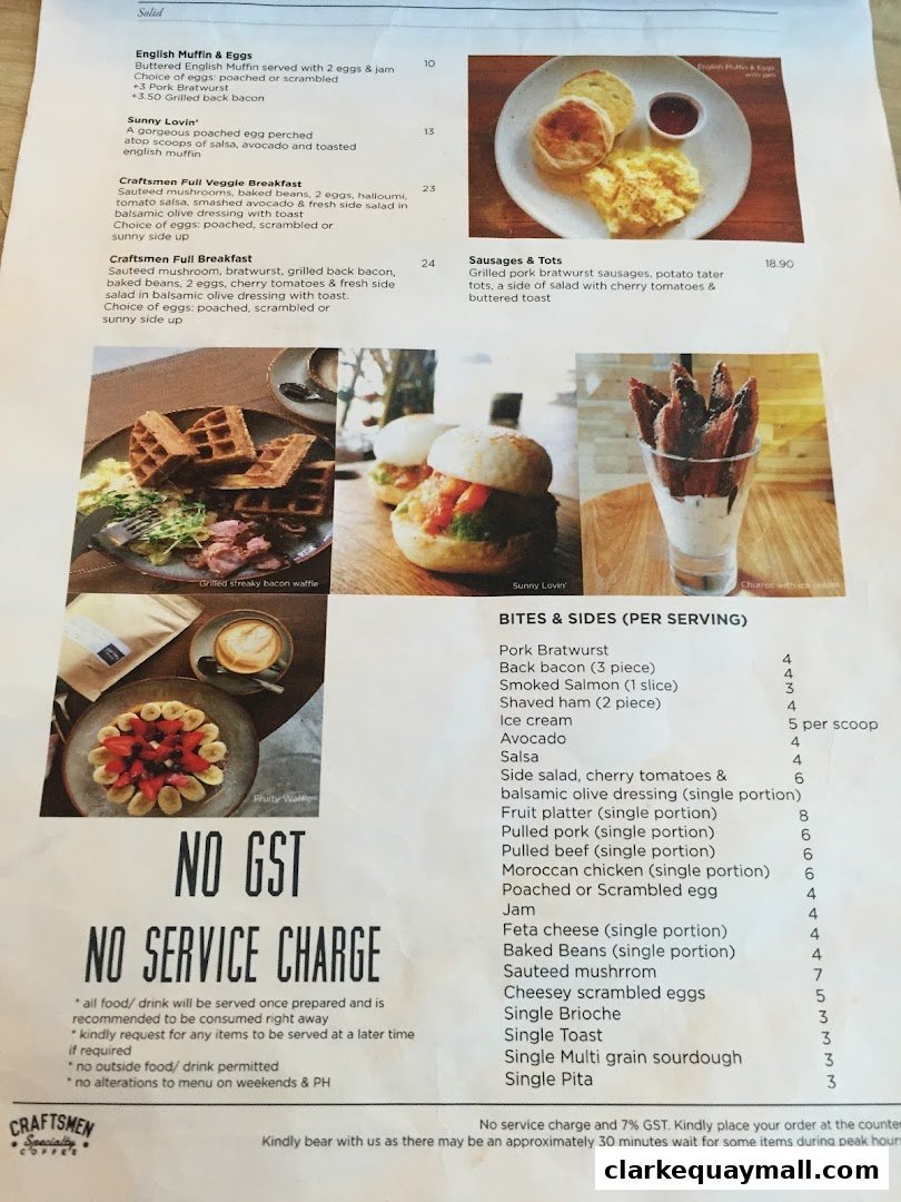 A menu from Craftsmen Coffee Clarke Quay Central featuring breakfast items and sides.
