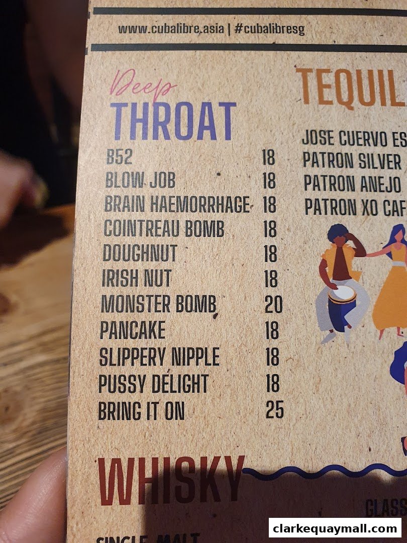 A close-up of a menu with cocktail names and prices, featuring categories like 'Deep Throat' and 'Tequila'.