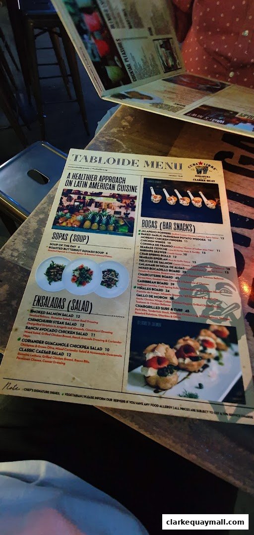 A menu from Cuba Libre Cafe Bar featuring Latin American cuisine, soups, salads, and bar snacks.