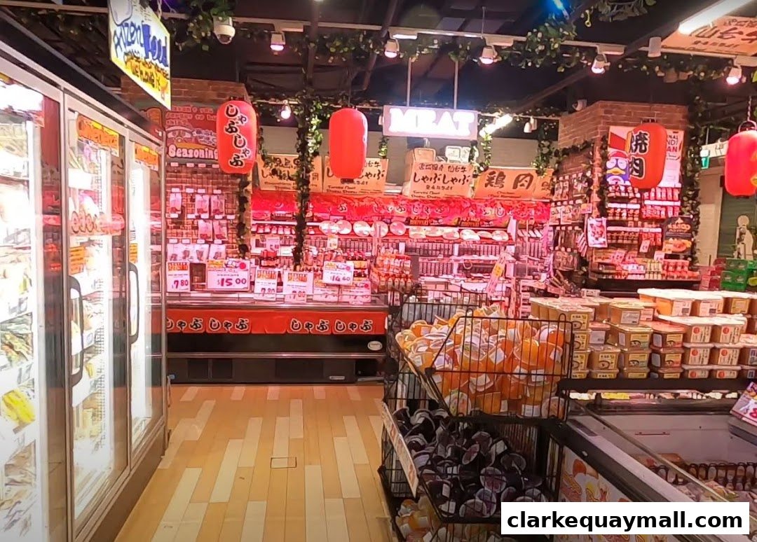 Interior view of a DON DON DONKI store showcasing a wide variety of food products, including meat and packaged goods.