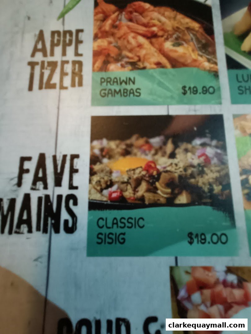 A menu featuring Filipino seafood dishes like Prawn Gambas and Classic Sisig.