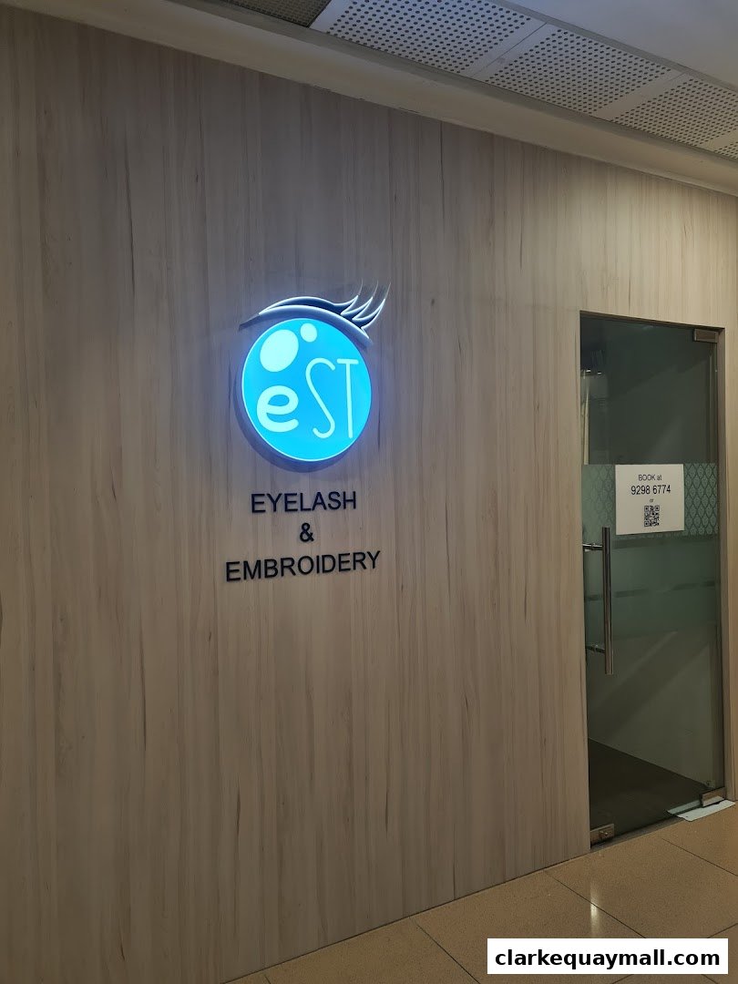 The entrance to Eye Studio Tokyo, specializing in eyelash and embroidery services.