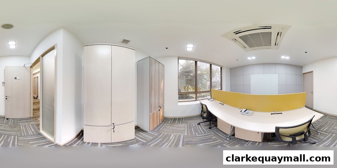 Modern office interior with workstations, storage, and a reception area.