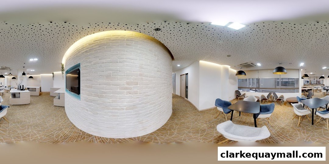 Interior view of a modern lounge area with white brick walls, contemporary furniture, and unique ceiling design.