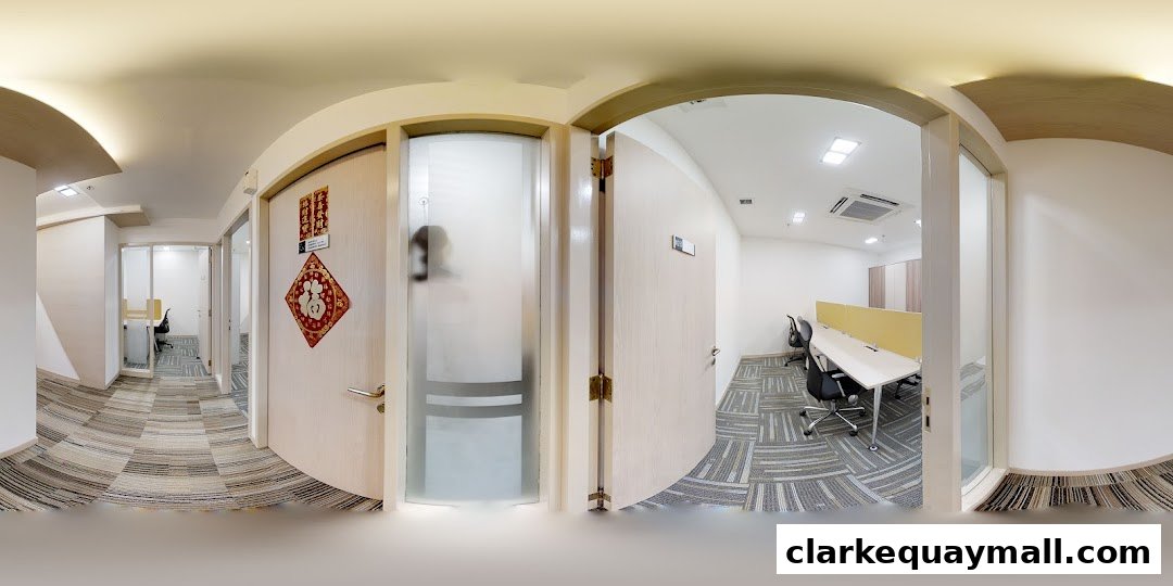 Interior view of an office space with cubicles and doors, decorated with Chinese New Year ornaments.