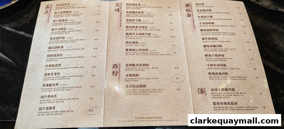 A menu from Fu Yuan Teochew Dining featuring various dim sum, rice, noodle, and soup dishes.