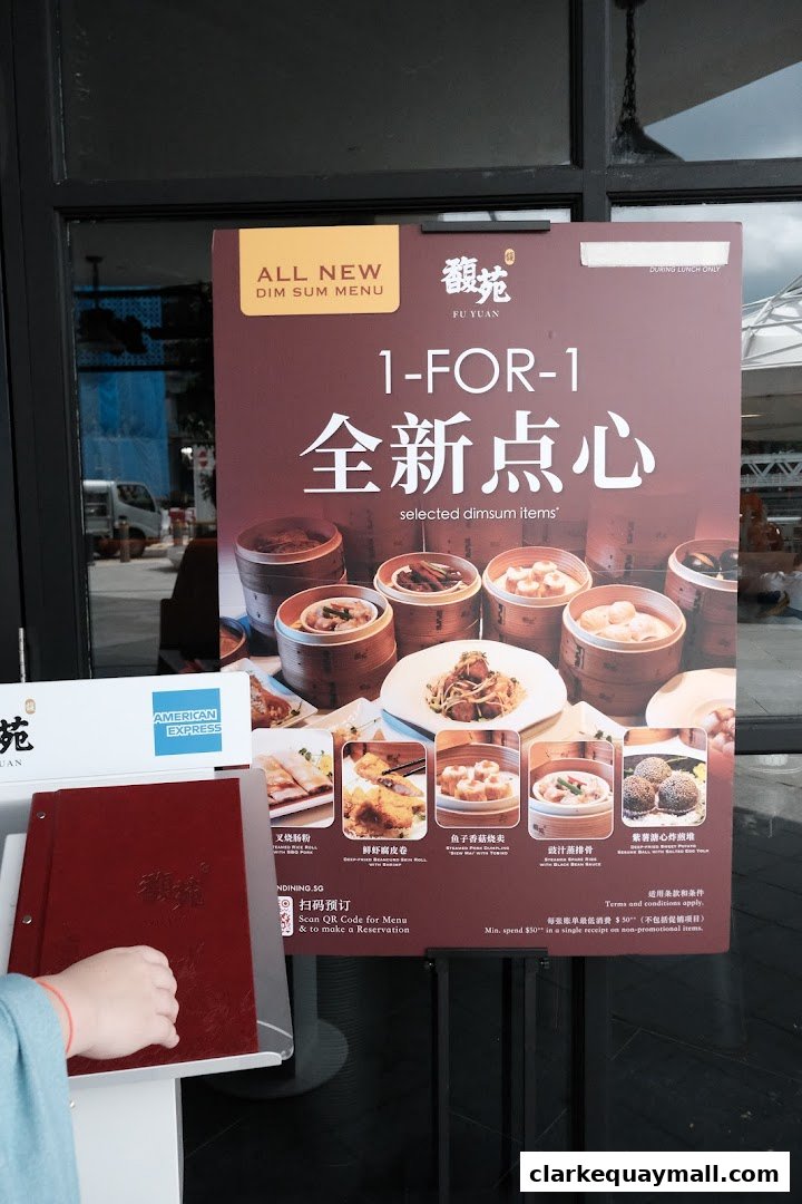 A promotional sign for Fu Yuan Teochew Dining's 1-for-1 dim sum offer.