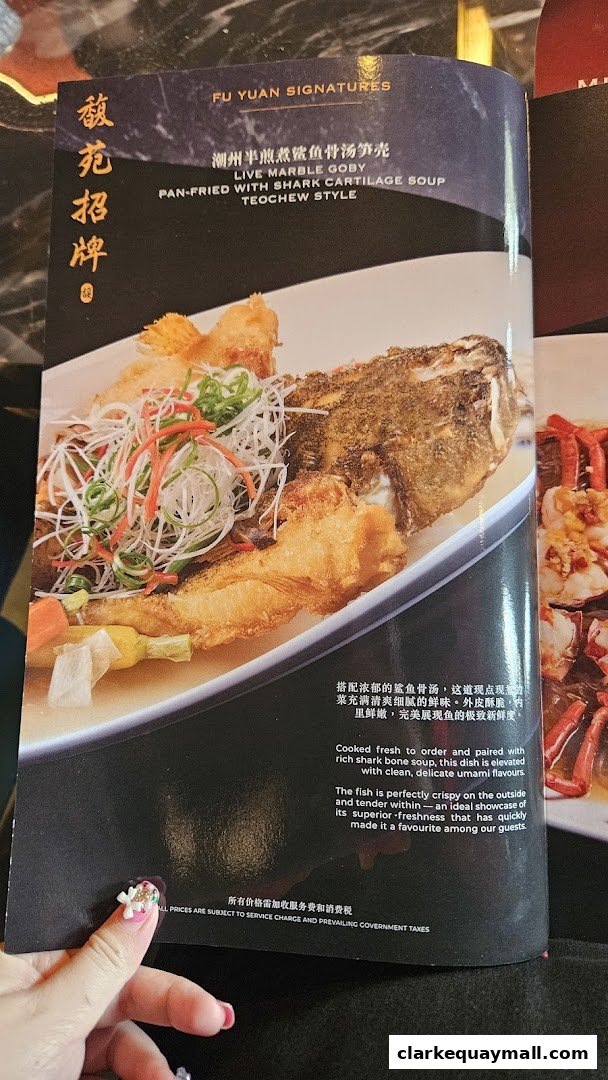 A menu featuring a pan-fried marble goby dish with shark cartilage soup.