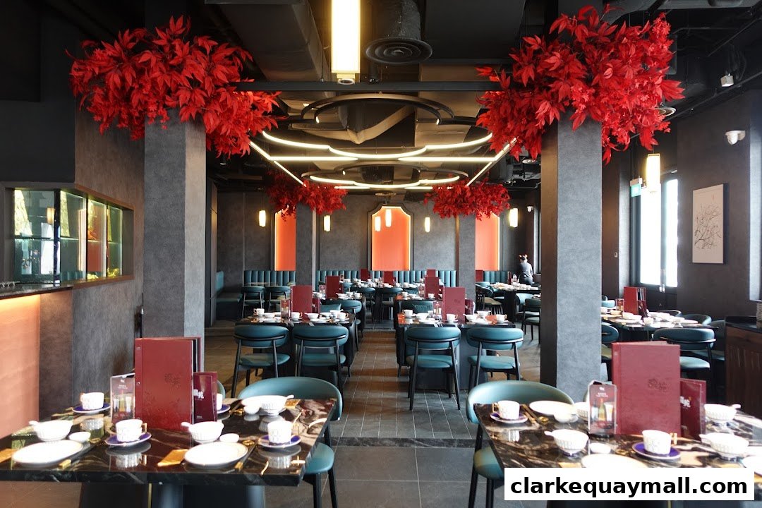 Interior view of a modern Teochew dining restaurant with elegant decor and table settings.