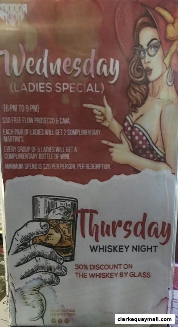 A promotional flyer for Gabbar Bistro Bar featuring Wednesday Ladies Special and Thursday Whiskey Night offers.