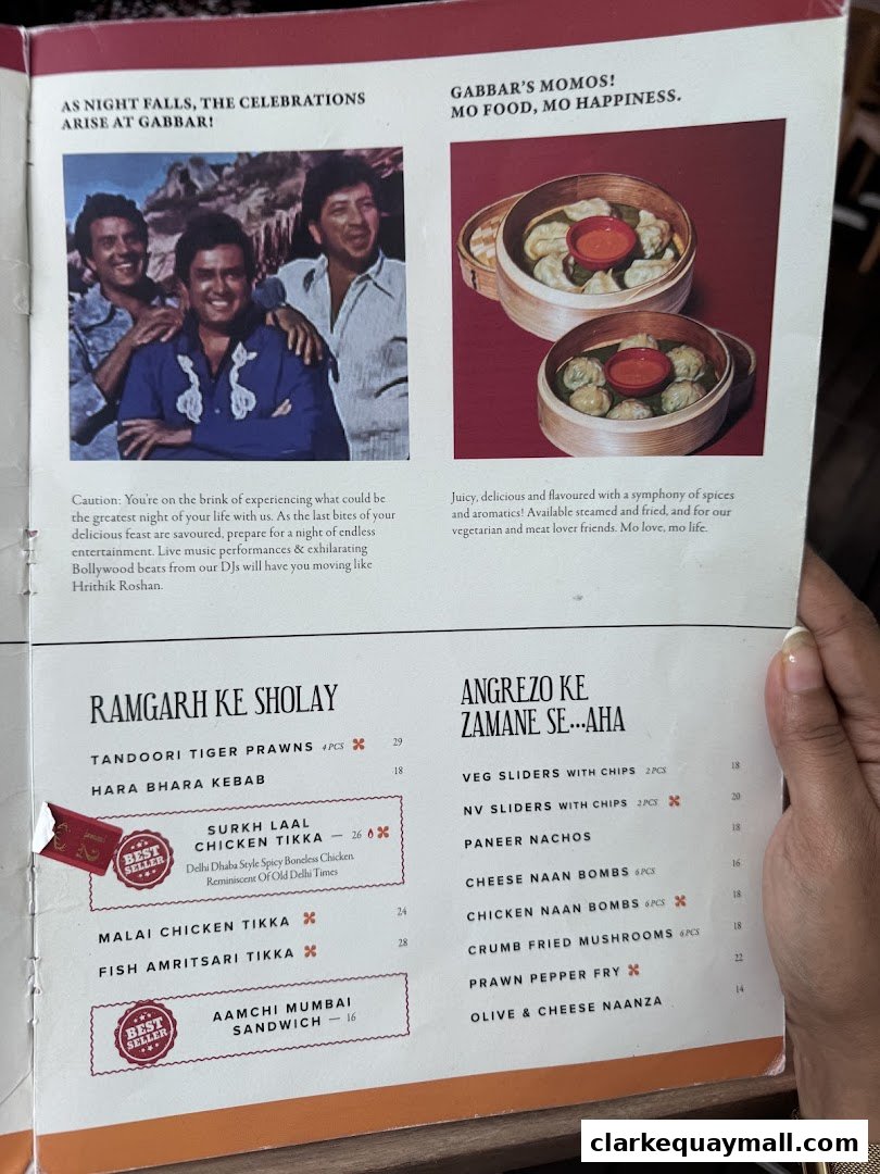 A menu from Gabbar Bistro Bar featuring Indian dishes and appetizers with images.