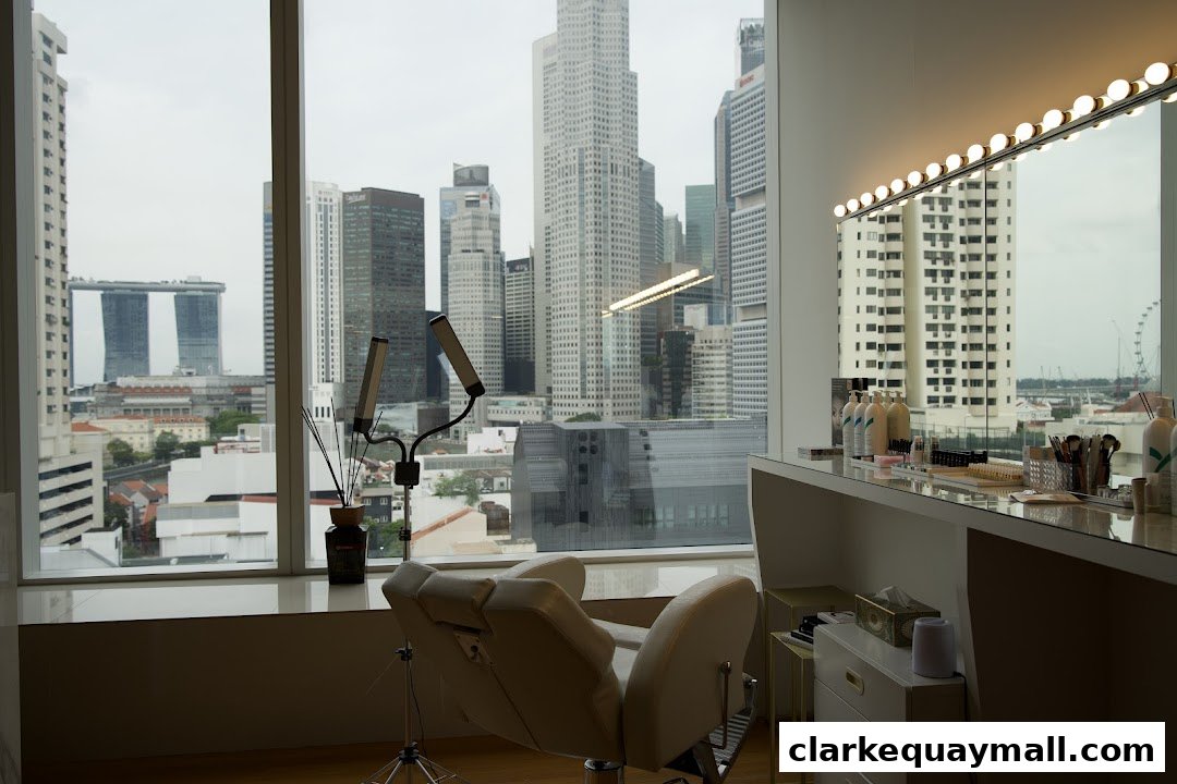 A beauty salon interior with a chair and makeup station overlooking a city skyline.